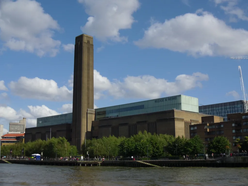 Tate Modern's riverside facade and brick chimney in London